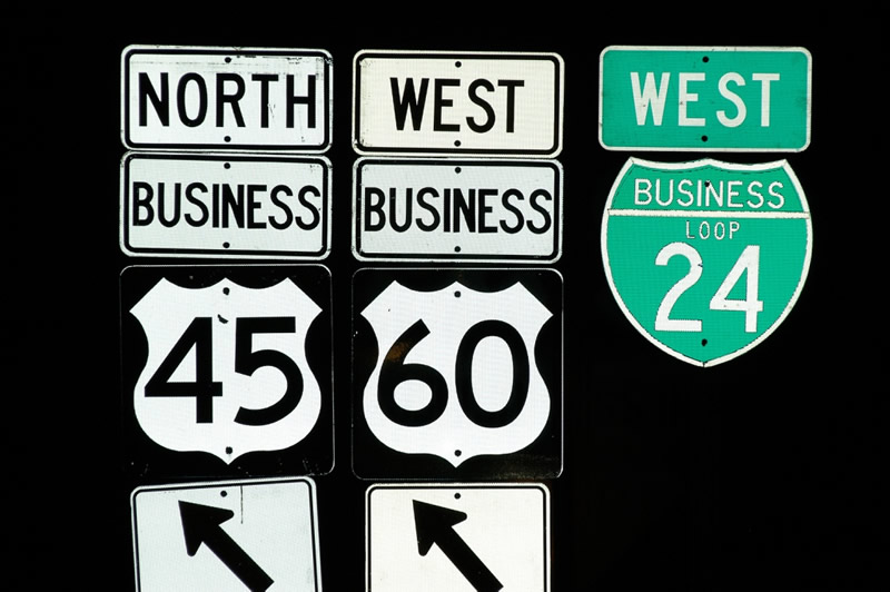 Shield along the Paducah business route, which follows John Puryear Parkway (at the Interstate 24/Husband Road interchange) into Paducah via U.S. 60-62 and Business U.S. 60-62.