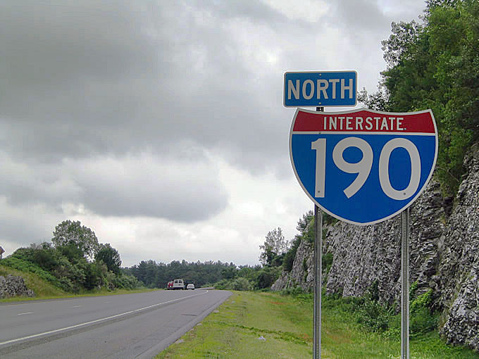 Northbound Interstate 190 reassurance shield posted between Exits 5 and 6.