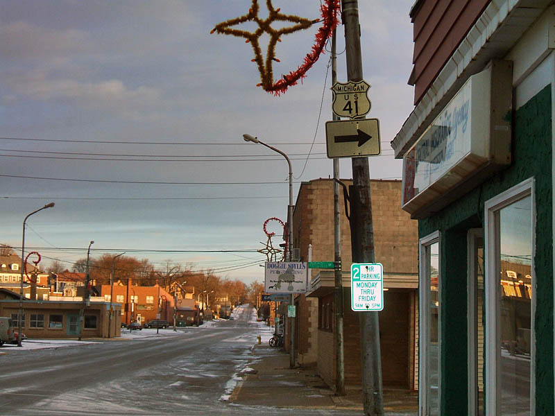 Pair of old signs in the Upper Peninsula.