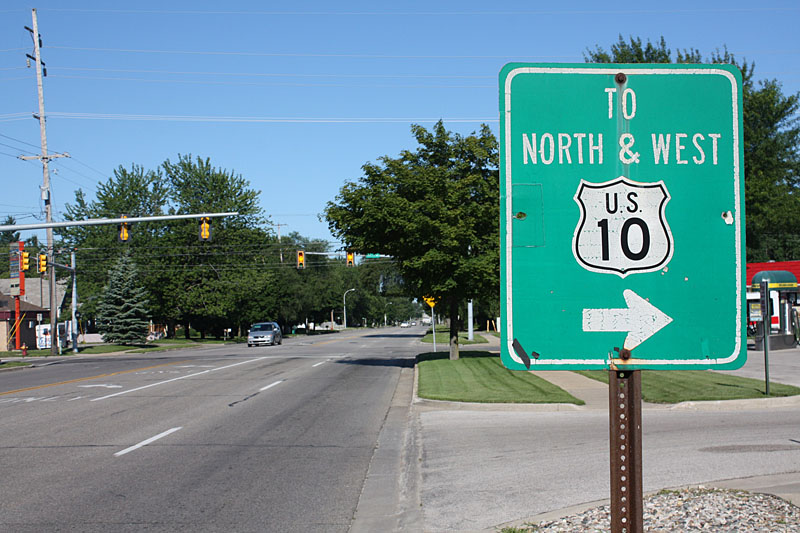 Bay City Road, Midland.  <i>In the 1950s, this was route M-20 west from Bay City (instead of originating in Midland as it does today).  US 10 came up from Saginaw on what is M-47 today.  When the I-75 freeway was built, US 10 was moved to the M-20 position, and the US 10 freeway parallel to the old Bay City Road between Bay City and Midland.  So â€“ this oddball was meant to direct traffic from the old road to the new one, less than a mile to the north.</i>