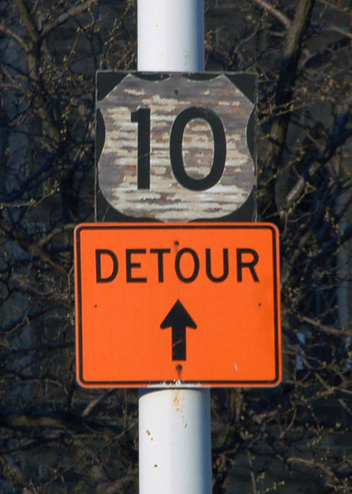 Sign in a construction zone, well after US-10 was decommissioned in Detroit.