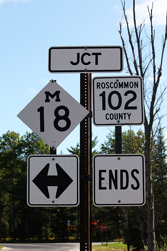 Markey Township.  The cutout M-18 shield is made by Roscommon County.