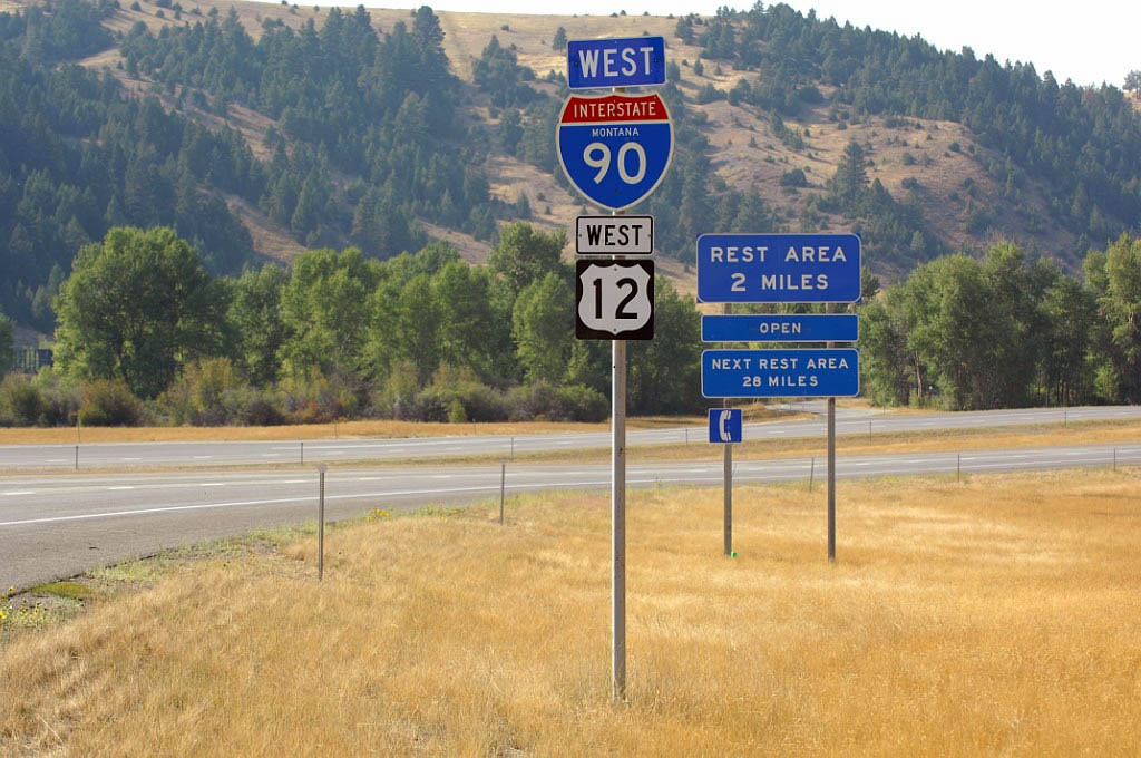 Westbound Interstate 90 and U.S. 12 northwest of Deer Lodge approaching a rest area.