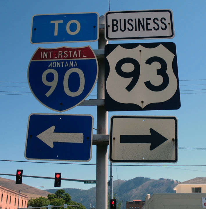 Eastbound Business Loop I-90 approaching Business U.S. 93 (Orange Street) in Missoula. The interstate shield is gradually losing the letters in the state name. First
