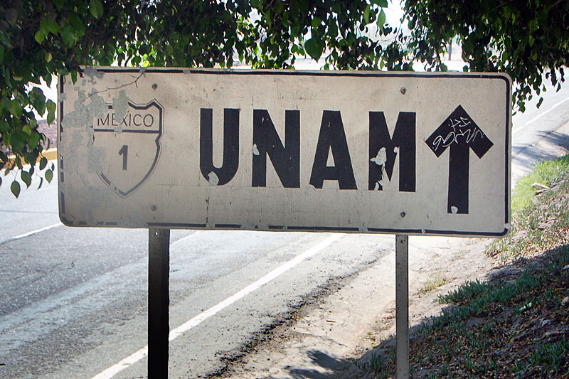 Ensenada.  This white guide sign dates back to the 1950s.