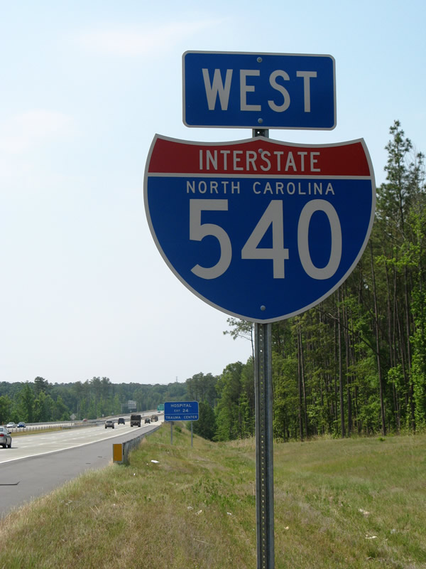First westbound shield along Interstate 540 north of U.S. 64 & 264.