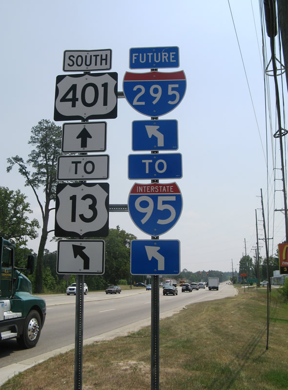 Future Interstate 295, Interstate 95, U.S. 13, and U.S. 401 shield assembly posted along Ramsay Street southbound at the west end of Future Interstate 295 north of Fayetteville.