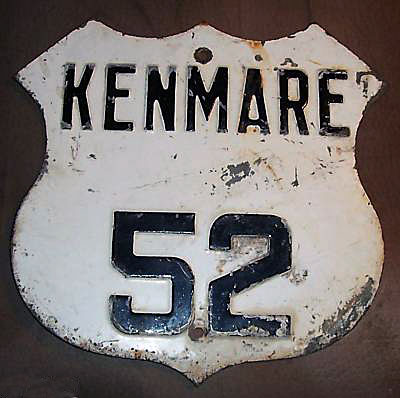Combination of town boundary marker and US highway shield.