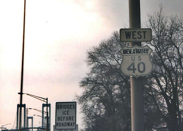 Delaware shield, overprinted with New Jersey.  This sign was on southbound I-295, in New Jersey just before the state line.