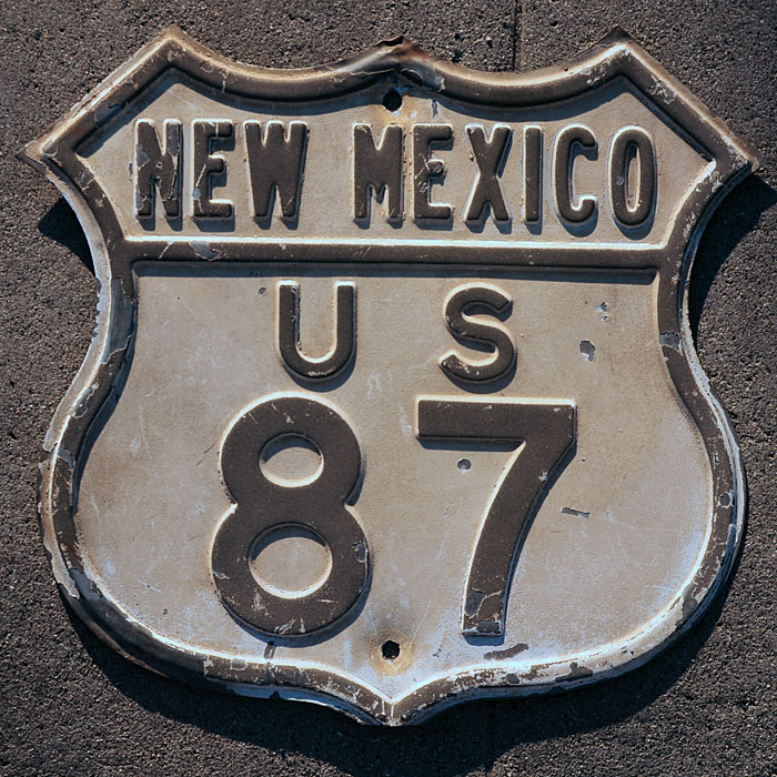 Only known New Mexico route shield with glass beads rolled over the embossed highlights.