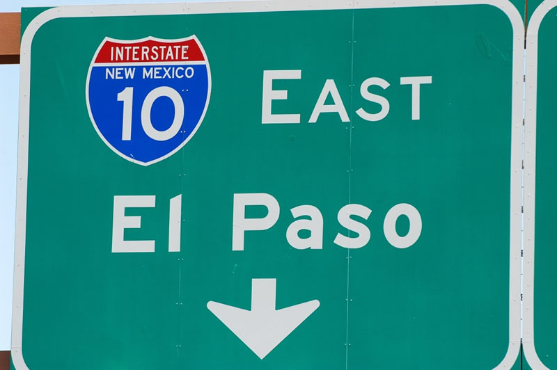 Overhead sign on eastbound Interstate 10 at Exit 144, Junction Interstate 25 in Las Cruces.