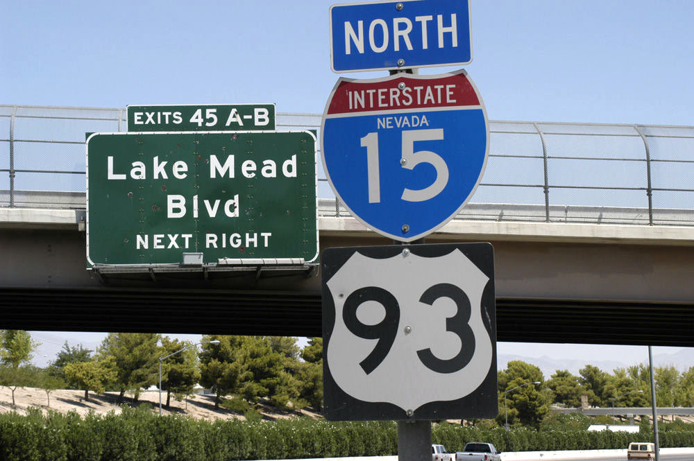 Northbound reassurance shields approaching Exit 45 in Las Vegas.  Note early 1960s porcelain guide sign in the background.