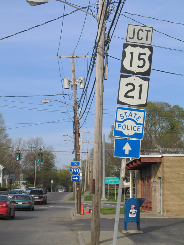 New York 63 east at New York 15 & 21 - Wayland. New York 15 references its former life as U.S. 15.