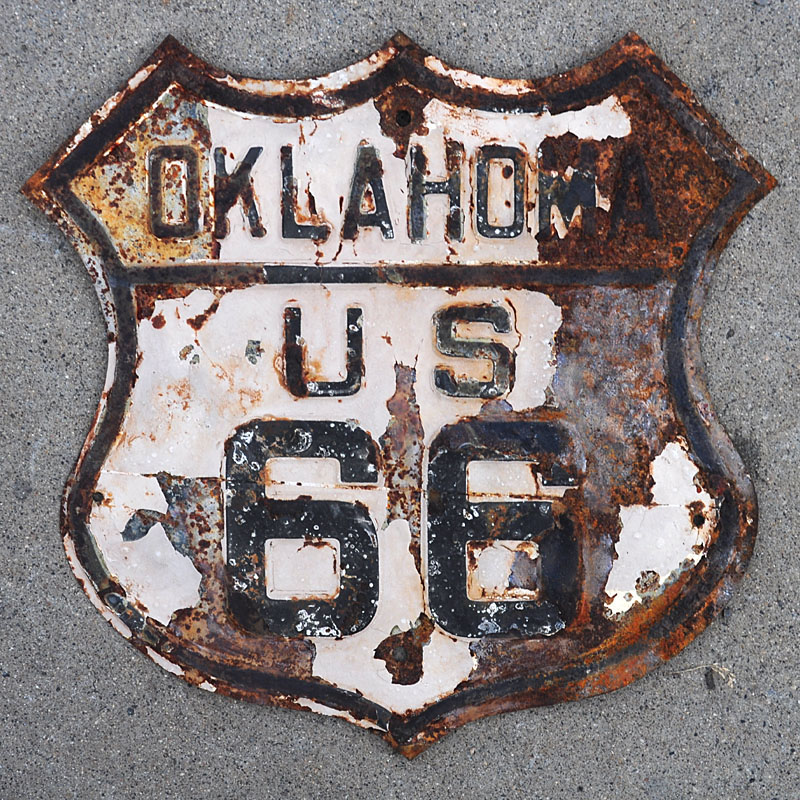 This sign was originally non-reflective, and had reflective sheeting applied years after its original installation.