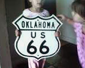 Replica embossed shield.  Oklahoma never used the embossed round fonts