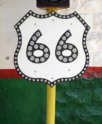 US-66 sign - either the genuine article, intended for green guide sign use, or a replica assembled from surplus parts. 24x24 inch size.