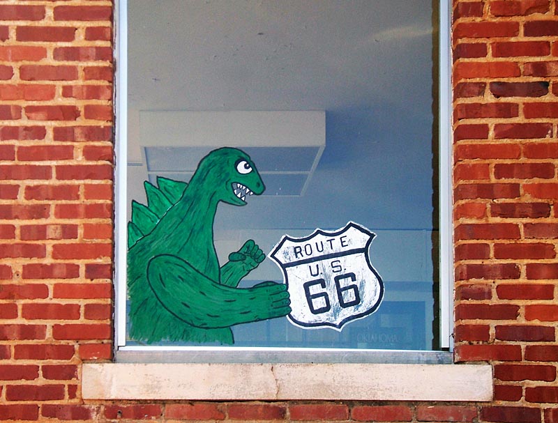 Inexplicable, yet strangely endearing, window mural in Clinton, Oklahoma.
