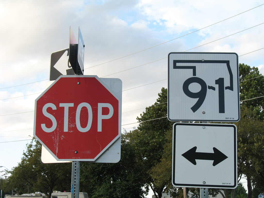 Oklahoma 91 shield posted at the end of the northbound off-ramp from U.S. 75.