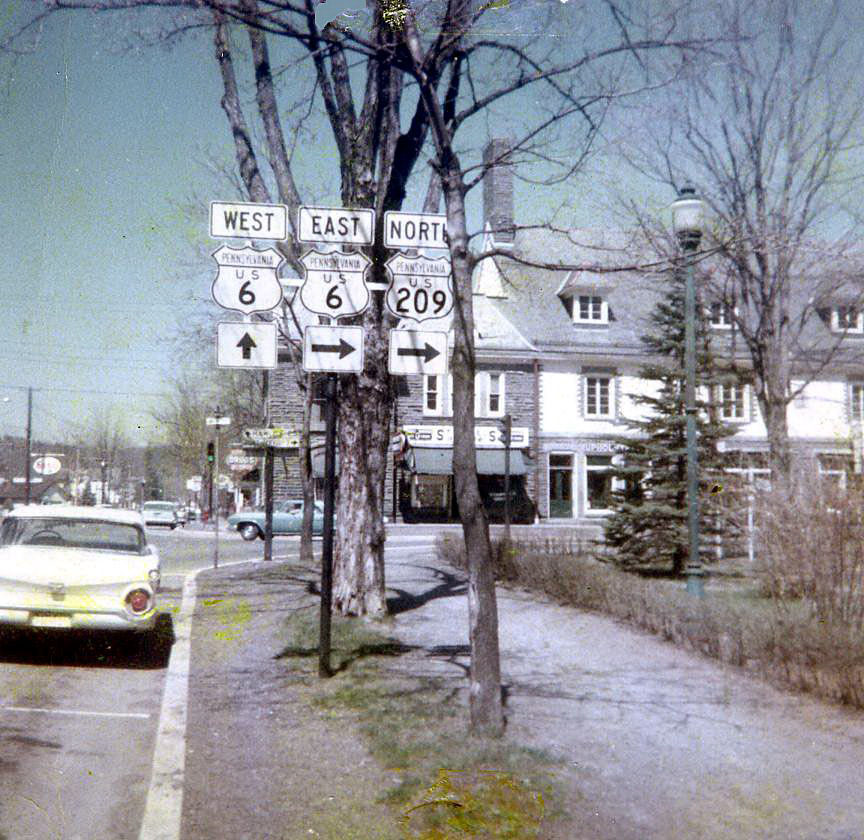 <i>These shots are taken from the south, looking from the left in <a href="http://shields.aaroads.com/show.php?image=PA19480061">the previous photo set</a>. My then-girlfriend took the 1962 photo, and I took the newer one last Thursday. I was hoping to duplicate the position from memory, and I was a little too close. The sign gantry seems to be in the same position. However, believe it or not, some clown installed the lamp post within a foot of the US 209 sign. Sheesh!</i>