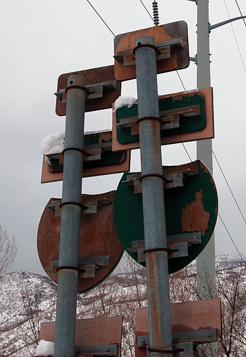 The old shields survive underneath.