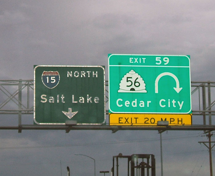 Old and new guide signs on Interstate 15 northbound in Cedar City.