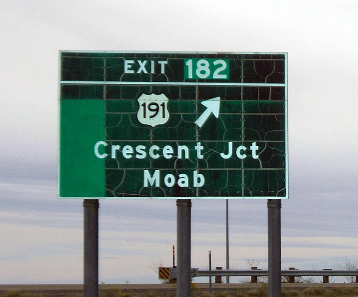 Guide sign on I-70 westbound.  This style of guide sign in Utah has a habit of losing its reflective green sheeting, as this example has done.