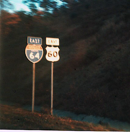 Cutouts with no border, of the same shape as used on overhead signs, were used as reassurance along freeways.