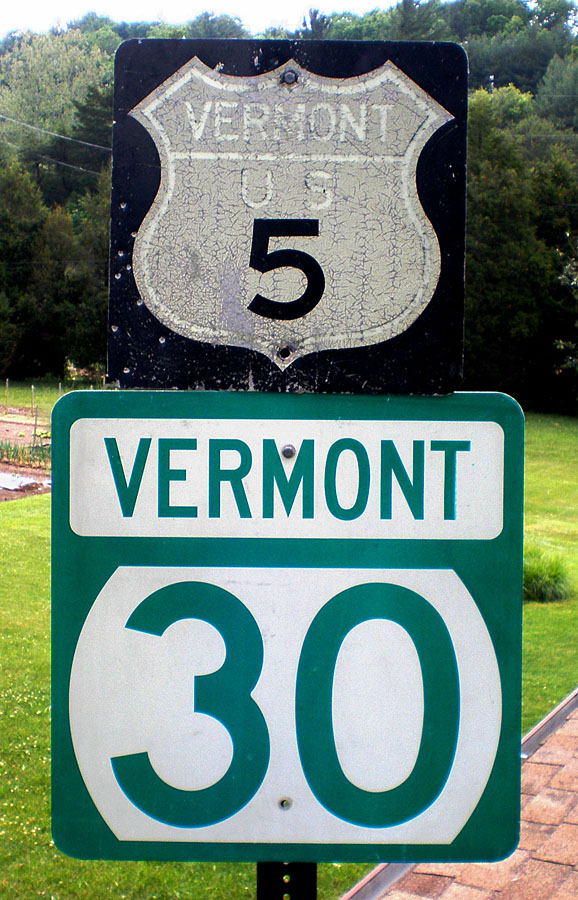 Old and new.  1961 specification US-5 and 1995 specification state route 30 reassurance markers.  Some of the black has peeled off the 5, revealing still-reflective Scotchlite.