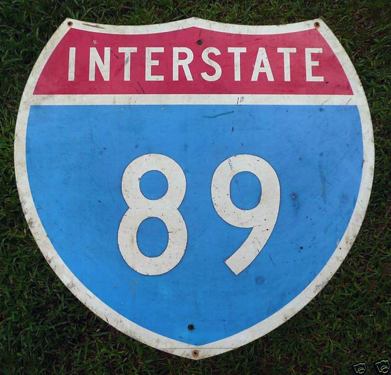 This sign, made to 1957 specification as an I-81 shield by the state of New York, was reused to create an interstate 89 trailblazer across the border to Vermont.