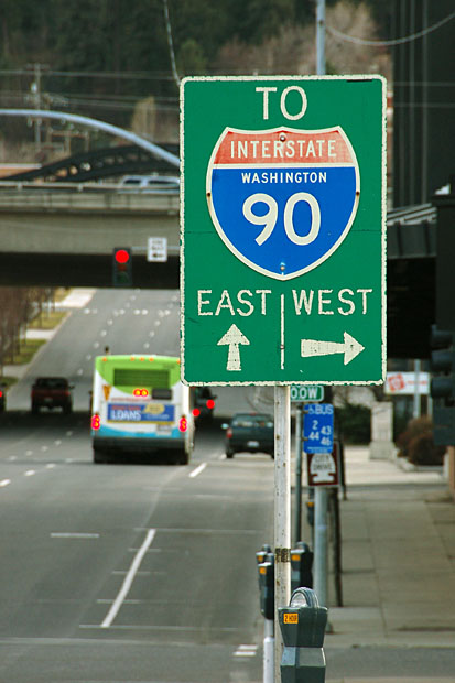 This guide sign dates to the opening of I-90. It has a green back, which was used only until the early 1960s.