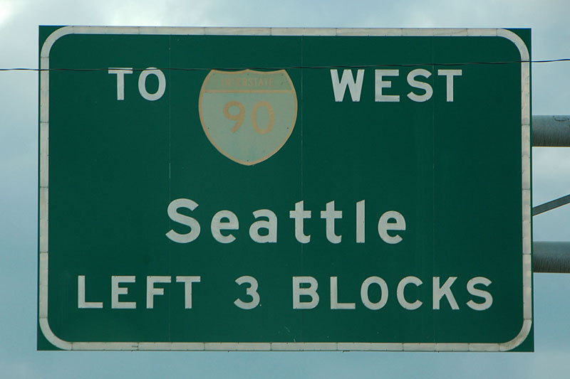 This 1970 style guide sign has the older small numbers.