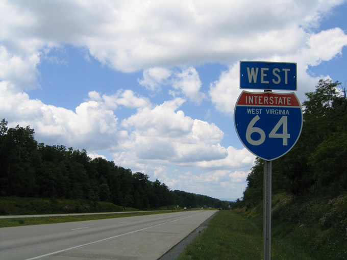 Westbound mainline shield posted between Exits 129 and 125.