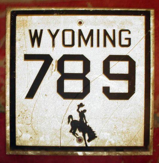 It is unknown why this relatively recent sign has the older block fonts.  Wyoming must have made flat and embossed signs during the same era, as numerous embossed markers with round fonts exist.  Route 789 was commissioned in 1954.