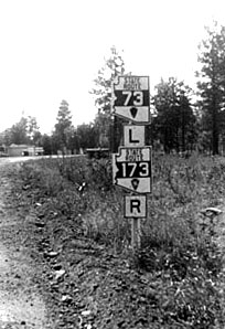 Arizona - state route right turn marker, state route left turn marker, State Highway 173, and State Highway 73 sign.