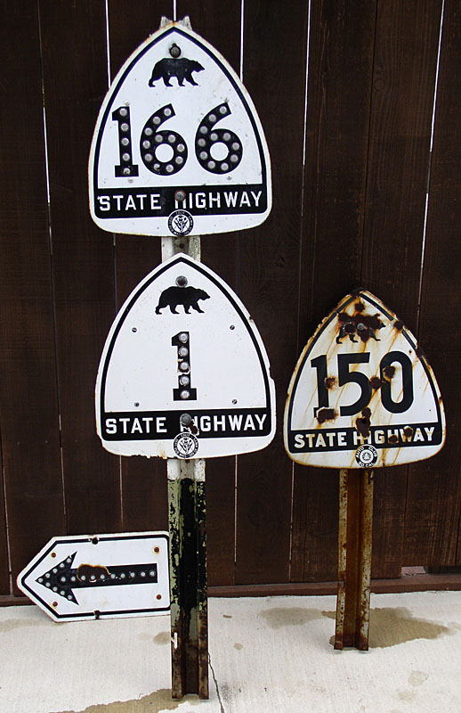 California - State Highway 150, State Highway 166, and State Highway 1 sign.