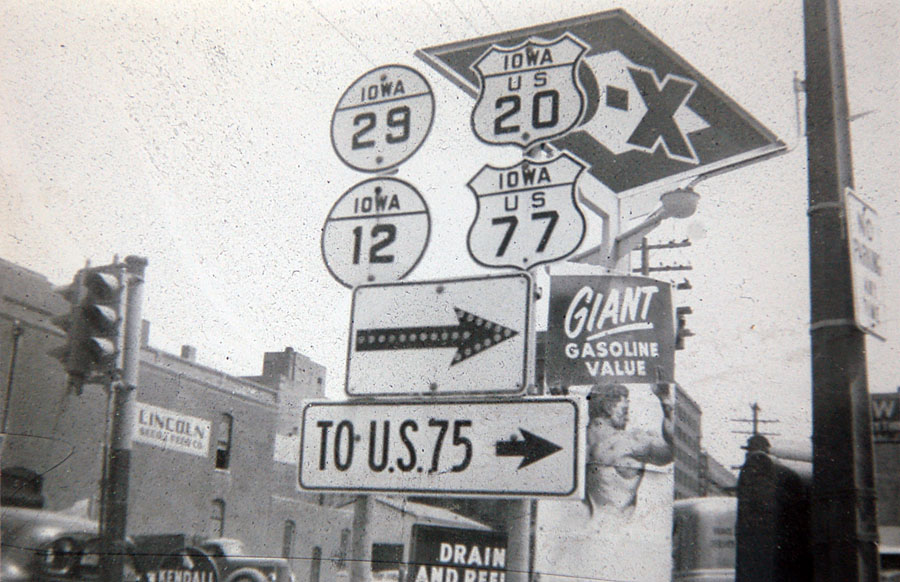 Iowa - state highway 12, state highway 29, U. S. highway 77, and U. S. highway 20 sign.