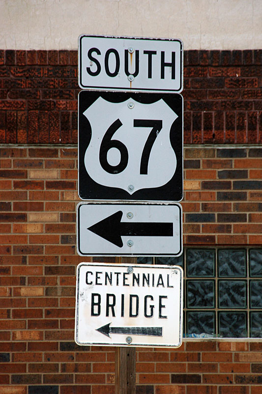 Iowa - U.S. Highway 67 and Centennial Bridge sign.