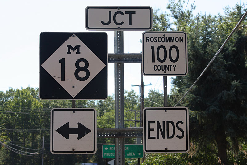 Michigan - State Highway 18 and Roscommon County route 100 sign.