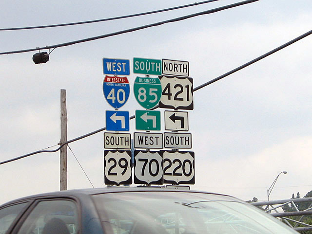 North Carolina - Interstate 40, U.S. Highway 220, U.S. Highway 70, U.S. Highway 29, U.S. Highway 421, and business loop 85 sign.