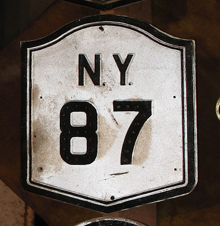 New York State Highway 87 sign.