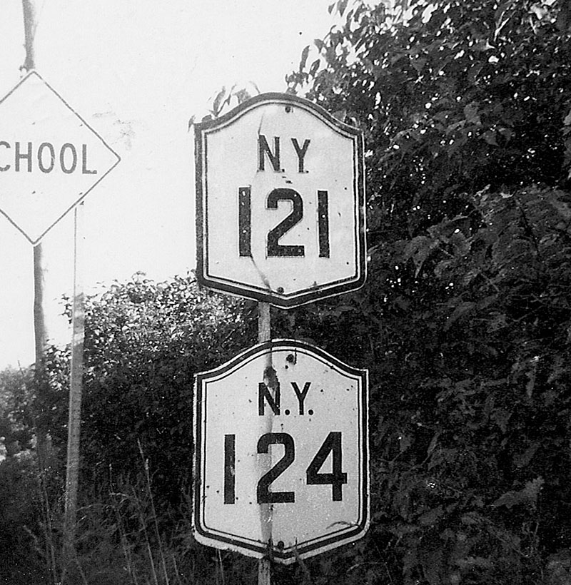 New York - State Highway 121 and State Highway 124 sign.
