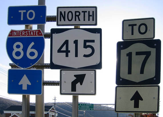 New York - state highway 415, interstate 86, and state highway 17 sign.
