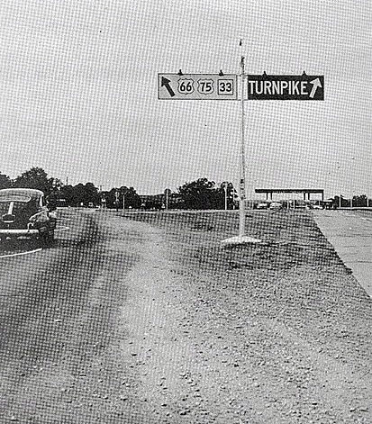 Oklahoma - state highway 33, U. S. highway 75, and U. S. highway 66 sign.