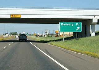 Just north of IH 35, the first exit on the SH 6 freeway is Beverly Drive.