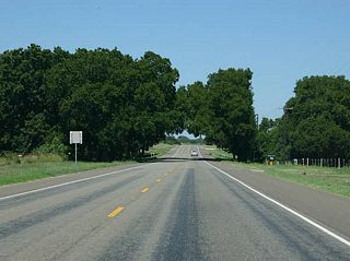 Between Meridian and Iredell, SH 6 has an idyllic feel as it travels through rolling forests.