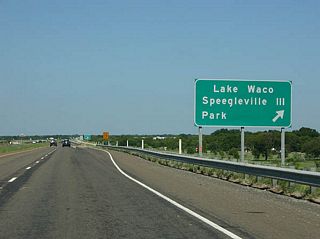 Now across the bridge, travelers find the exit for Lake Waco Speegleville III park.