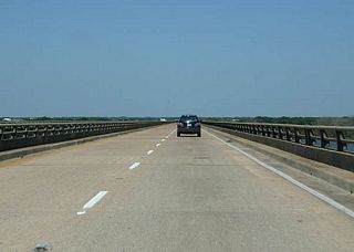 SH 6 crosses Lake Waco on a long bridge.