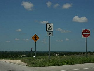 The US 281/SH 6 interchange is not a full interchange, as SH 6 crosses the southbound lanes of US 281 with no grade separation.