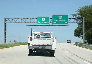 SH 6 exits to the left, while US 281 takes the right two lanes.