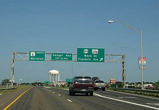 US 84 continues north into downtown Waco.